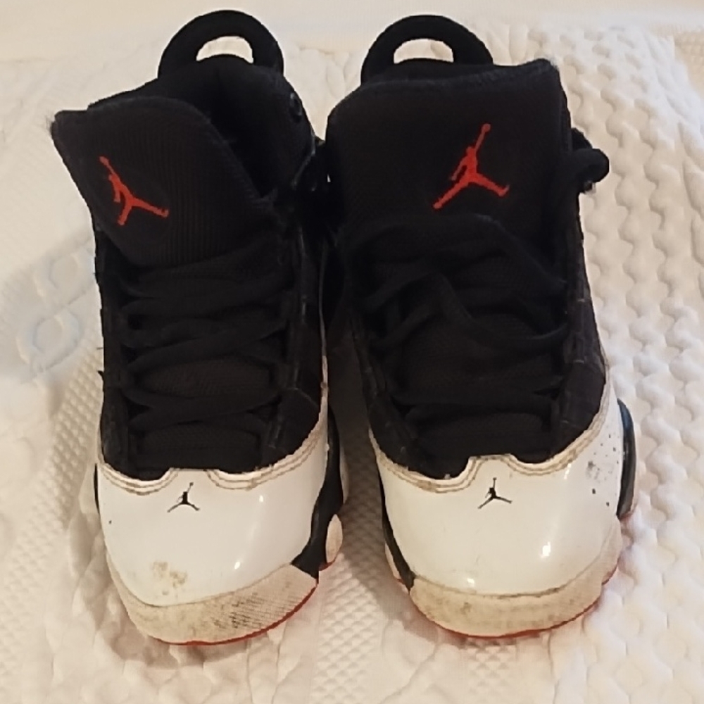 Jordan Kids Black and White Sneakers with Red Accents